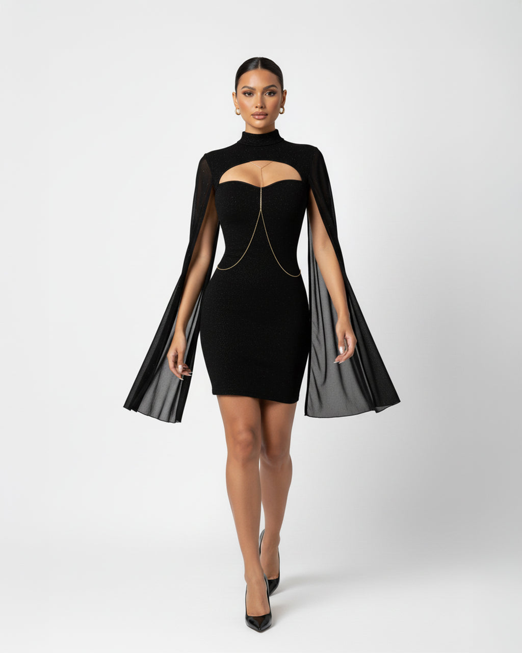 Black dress with cape on a white background