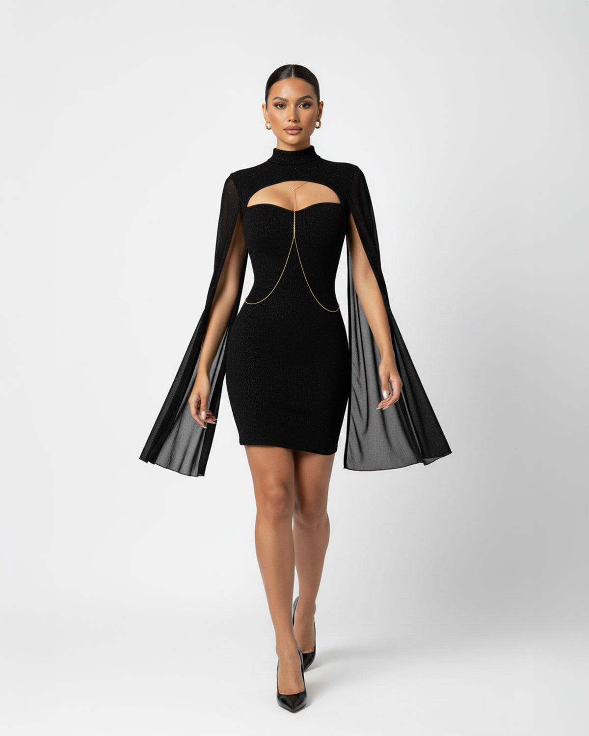 Black dress with cape on a white background